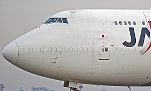 Boeing 747 passenger to freighter conversion featuring aluminum window plugs.