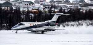 Pilatus Aircraft PC-24 on snow-covered gravel runway